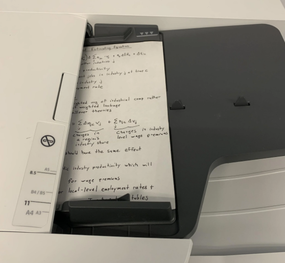 place the document you want to scan facing up in the tray above the menu panel